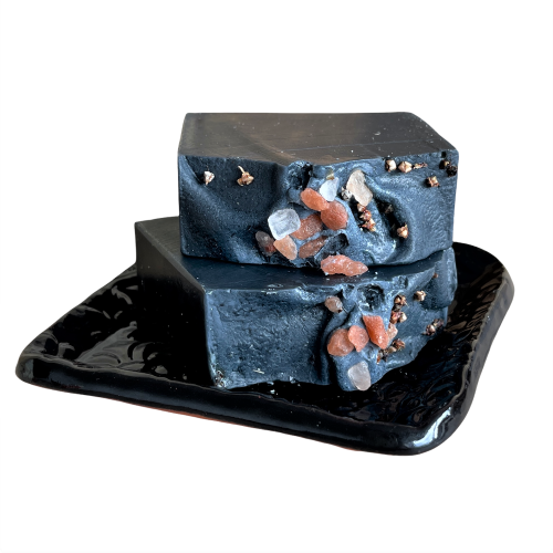 black ceramic soap dish and charcoal soap